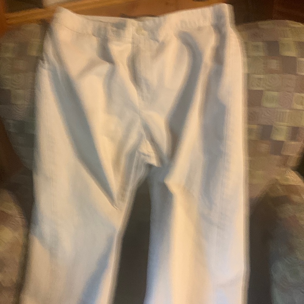 One pair of low rise  light tan pants size 14